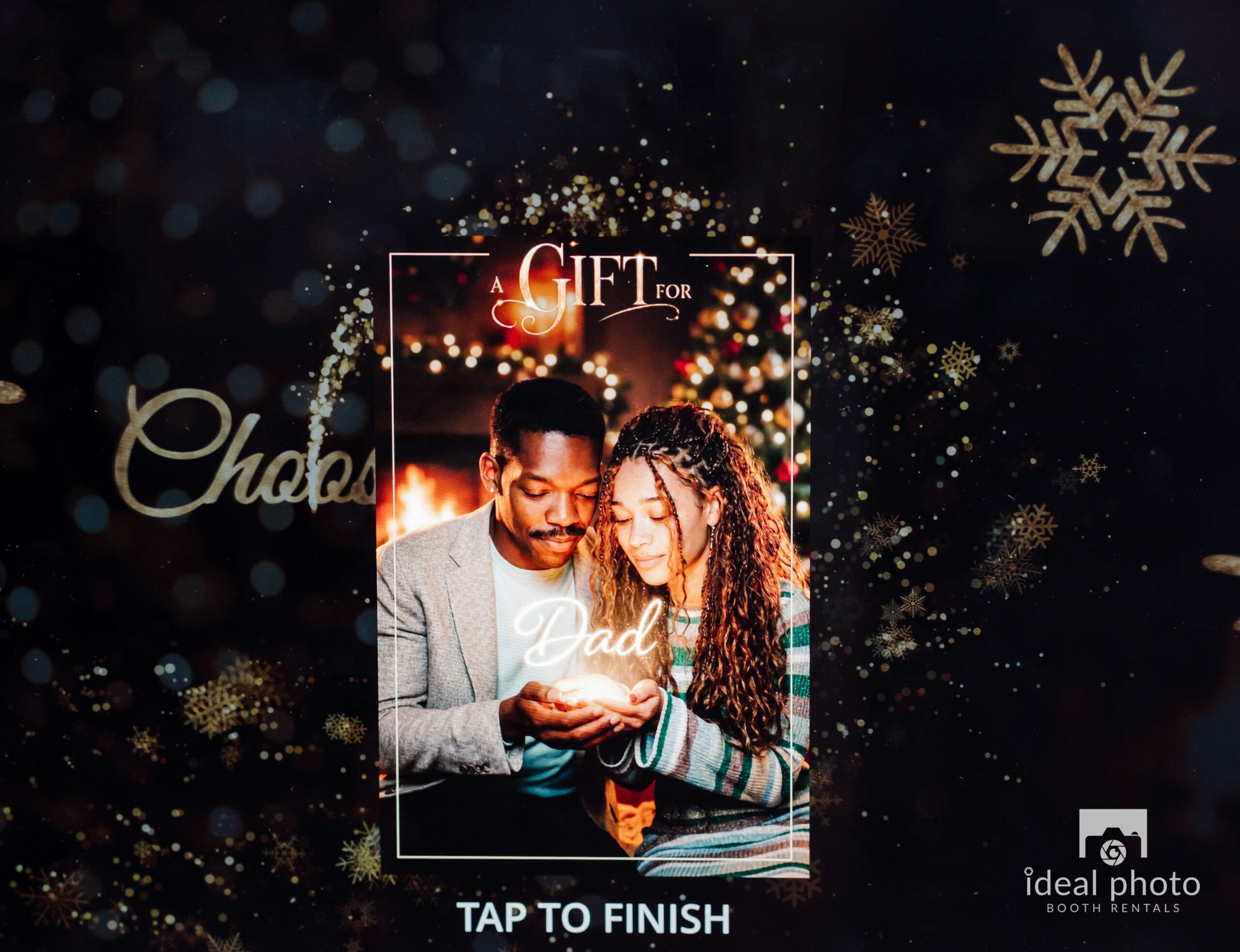 Guests enjoying a holiday photo booth experience at a Christmas event in Louisville, KY